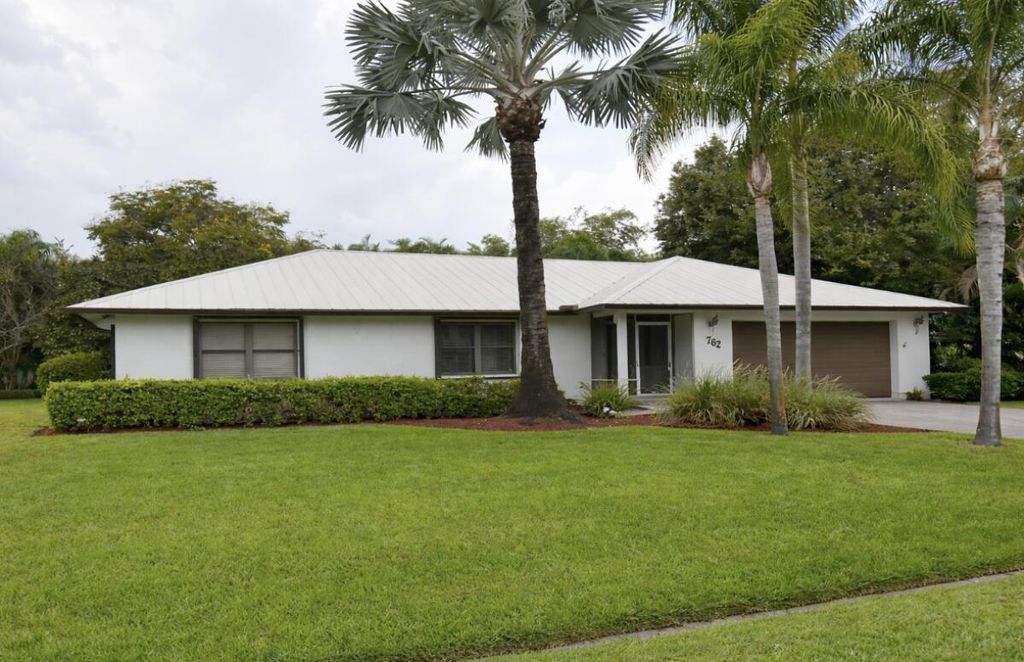 Photo of 762 SE Polynesian Avenue, Port Saint Lucie, FL 34983 (MLS # B26011644)