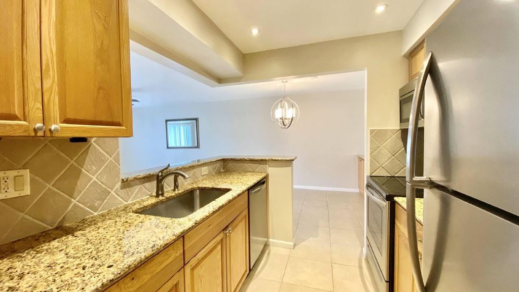 Photo of 125 Shore Court #102b, North Palm Beach, FL 33408 (MLS # R11102252)