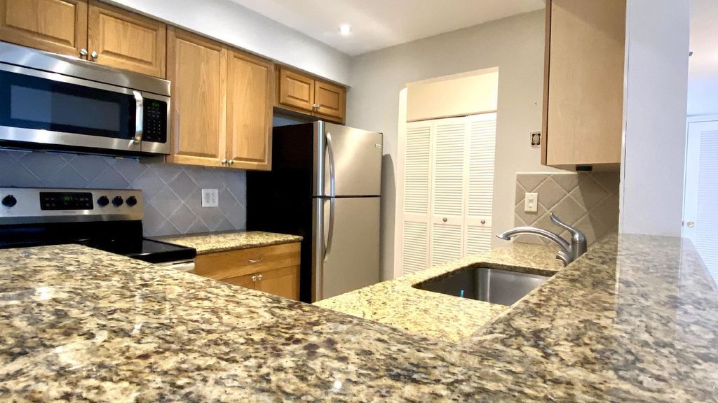 Photo of 125 Shore Court #102b, North Palm Beach, FL 33408 (MLS # R11102252)