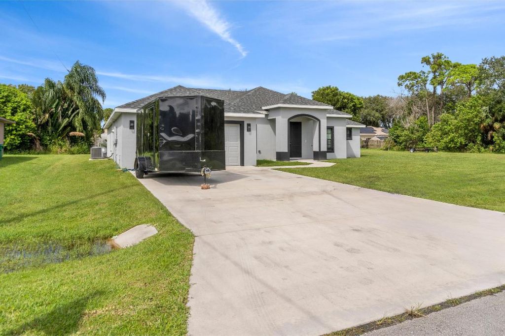 Photo of 6013 Spruce Drive E, Fort Pierce, FL 34982 (MLS # R11024962)