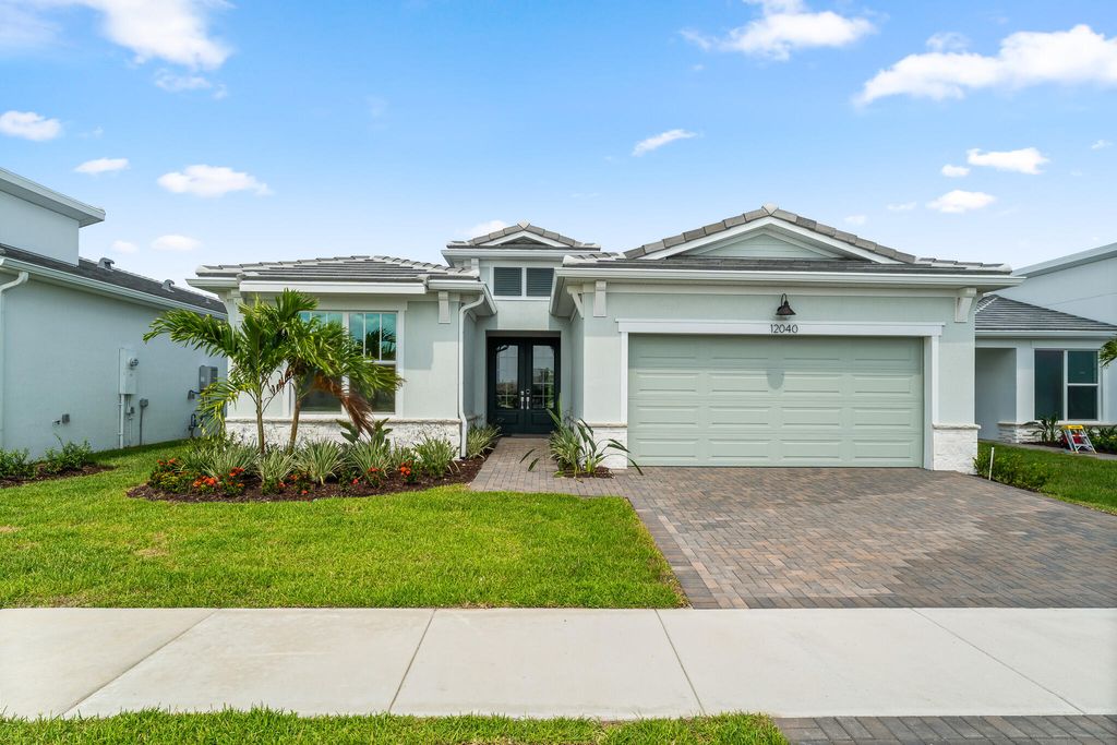 Photo of 12040 SW Pantone Street, Port Saint Lucie, FL 34987 (MLS # B26009345)