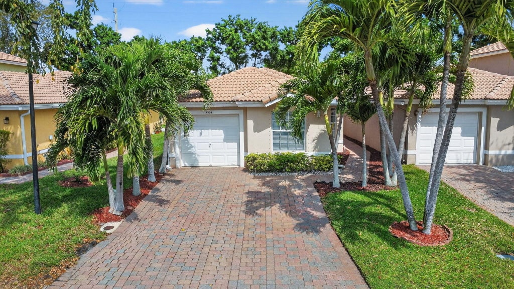 Photo of 3387 Commodore Court, West Palm Beach, FL 33411 (MLS # B26075759)