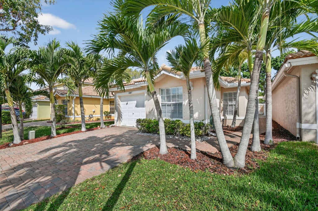 Photo of 3387 Commodore Court, West Palm Beach, FL 33411 (MLS # B26075759)