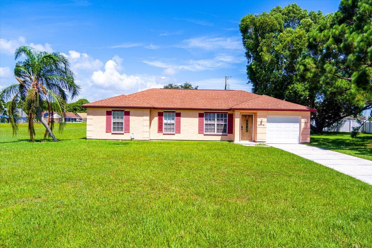 MUST SEE... This beautifully maintained 3-bedroom, 2-bathroom residence features a 1-car garage and a host of updates to offer comfort, style, & convenience and a Large Yard on a canalInside, enjoy partially upgraded features including brand-new flooring, a new refrigerator, a new water heater, & updated bathrooms. The kitchen is equipped w/ stainless steel appliances, and the front-loading washer & dryer make laundry a breeze. Smart home features like a smart thermostat & a security system w/ outdoor cameras (plus optional indoor cameras) add an extra layer of modern living & peace of mind. Yard will be fenced end of July or beginning of August. Included in the lease:✔ High-speed WIFI✔ Landscaping services✔ Pest control✔ Access to the security sys