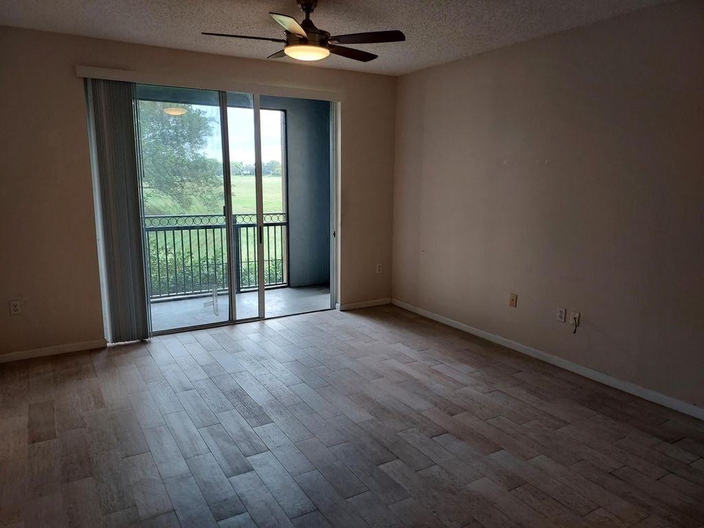 Photo of 11750 Saint Andrews Place #207, Wellington, FL 33414 (MLS # R10944004)