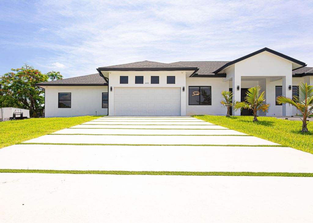 Photo of 640 Marshall Road, West Palm Beach, FL 33413 (MLS # R11097081)