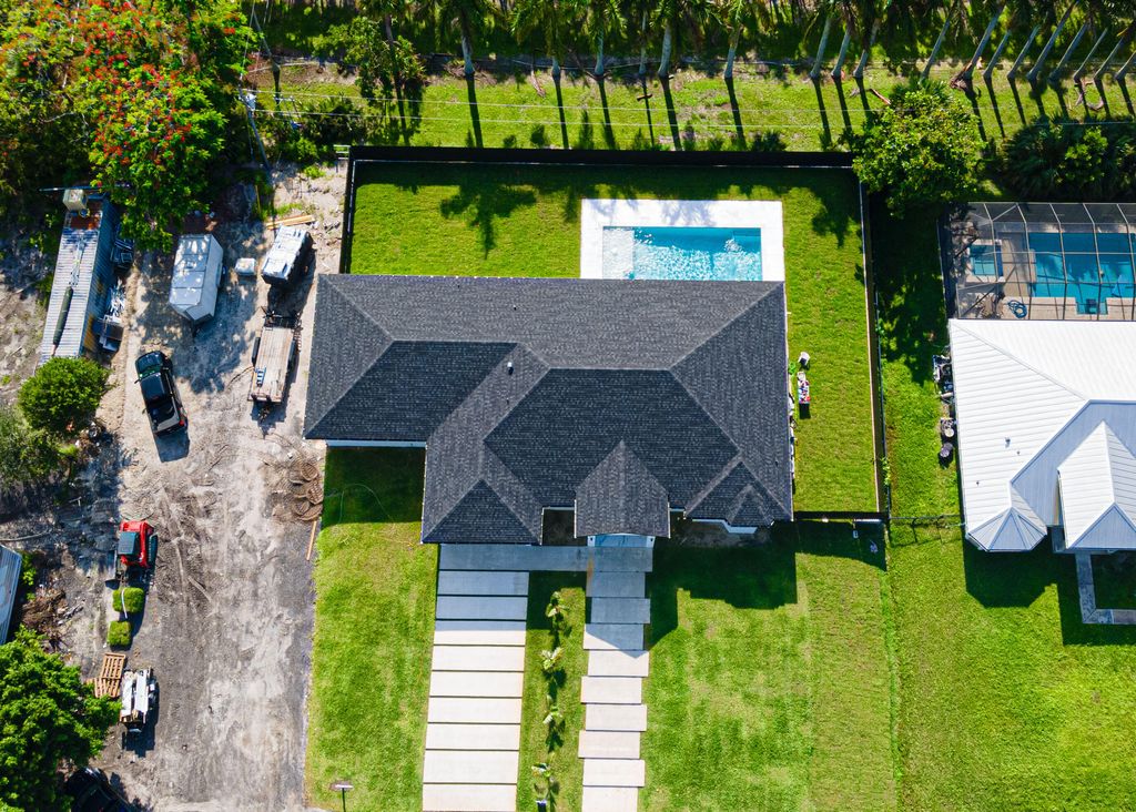 Photo of 640 Marshall Road, West Palm Beach, FL 33413 (MLS # R11097081)