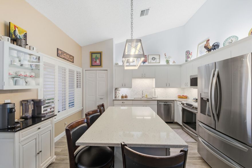 Beautifully remodeled 3-bedroom, 2-bath home in desirable Lantern Walk featuring a garage and soaring ceilings. The updated kitchen boasts soft-close cabinetry, farmhouse sink, stylish backsplash, and stainless steel appliances. Luxury Vinyl floors flow seamlessly throughout the home, complemented by custom closets in main bedroom and plantation window treatments throughout.
Enjoy true indoor-outdoor living with screened front and back porches, tile patios, and newly installed pavers--perfect for grilling and entertaining (a unique feature within the community). Additional upgrades include accordion shutters for piece of mind. New roof which is maintained by the HOA for added peace of mind.