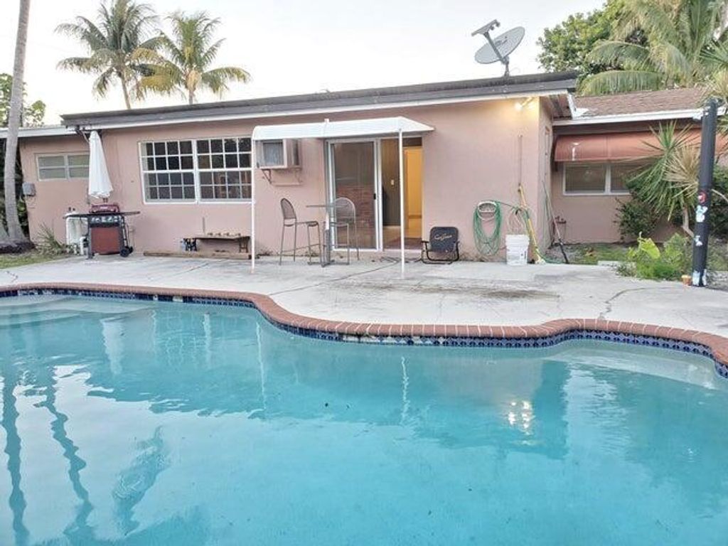 Photo of 817 Cinnamon Road, North Palm Beach, FL 33408 (MLS # R10943276)