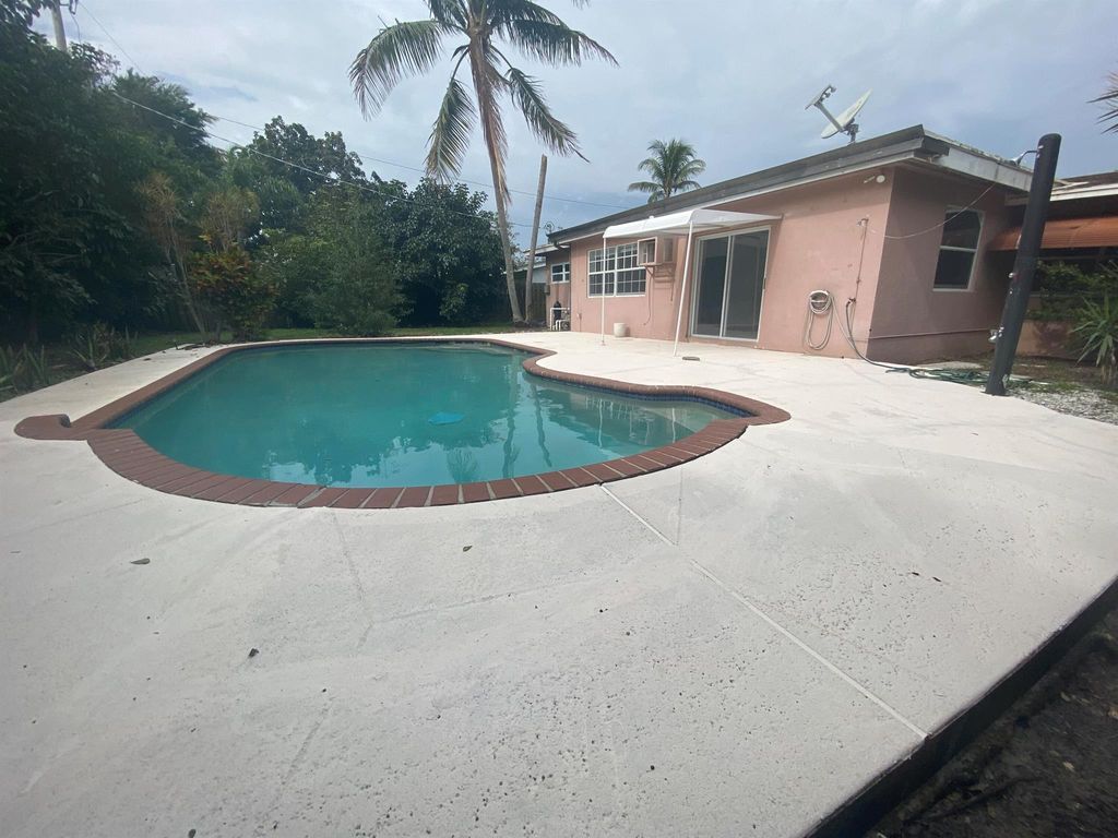 Photo of 817 Cinnamon Road, North Palm Beach, FL 33408 (MLS # R10943276)