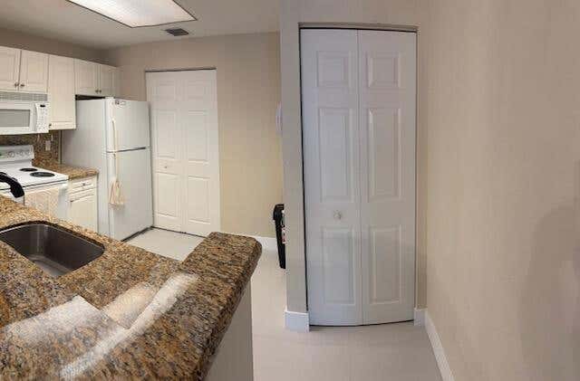 Photo of 2805 VERONIA Drive #104, Palm Beach Gardens, FL 33410 (MLS # B26059094)