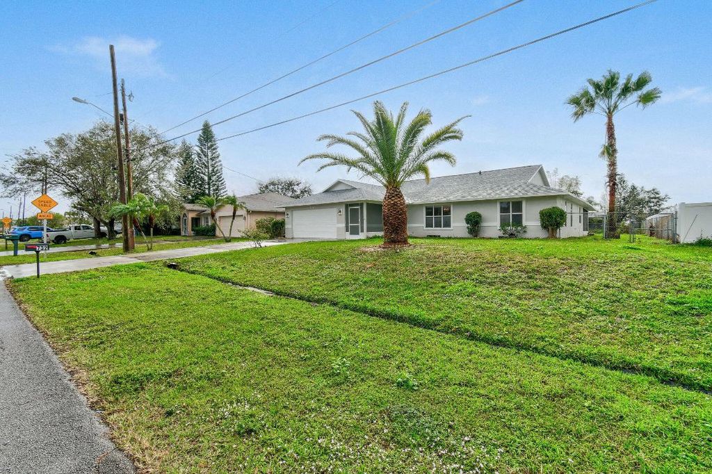 Photo of 732 SW Dalton Circle, Port Saint Lucie, FL 34953 (MLS # R10951430)