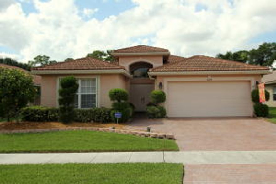 THIS WELL MAINTAINED SINGLE FAMILY ONE STORY HOME SITS ON A PRIVATE LOT WITH SCREENED IN POOL.  THIS READY TO MOVE IN 3/2 WITH 2 CAR GARAGE BOASTS OVER 1800 SQUARE FEET OF LIVING SPACE.  SEVERAL UPGRADES WHICH INCLUDES CALIFORNIA CLOSETS. PLANTATION SHUTTERS, CROWN MOLDING, TRACK LIGHTING  UPGRADED BATHS AND KITCHEN CABINETRY  ARE JUST A FEW OF THE UPGRADES IN THIS SPLIT FLOOR PLAN HOME.  POOL IS HEATED WITH SOLAR PANELS AND ACCORDIAN SHUTTERS ARE ON ALL WINDOWS. PHANTOM SCREEN IS INSTALLED ON FRONT DOOR.  HOT WATER HEATER AND WASHER AND DRYER WERE RECENTLY REPLACED. KITCHEN HAS GE PROFILE APPLIANCES, PANTRY, EAT IN KITCHEN AND CORIAN COUNTERS. HOME ALSO FEATURES POOL ALARM ON ALL DOORS AND WINDOWS IN BACK OF HOME. LIVING AREAS FEATURES NEUTRAL CERAMIC TILE, PERGO IN 2 BEDROOMS AND CARPET IN MASTER.  MASTER SUITE HAS 2 CLOSETS WITH BUILT IN CALIFORNIA CLOSETS, TRAY CEILINGS, SEPARATE SHOWER AND ROMAN TUB, HIS AND HERS SEPARATE SINKS AND VANITY AREAS.  THIS HOME HAS NO REAR NEIGHBORS AND BACKS UP TO A BERM. EXCLUDED FROM THE SALE OF THIS HOME IS KITCHEN CHANDELIER AND FAN IN MASTER BEDROOM BATHROOM FAN,. CEILING FAN IN BEDROOM THAT SERVES AS AN OFFICE,CEILING,  FRONT ENTRANCE CHANDELIER AND WASHER /DRYER DON'T CONVEY.