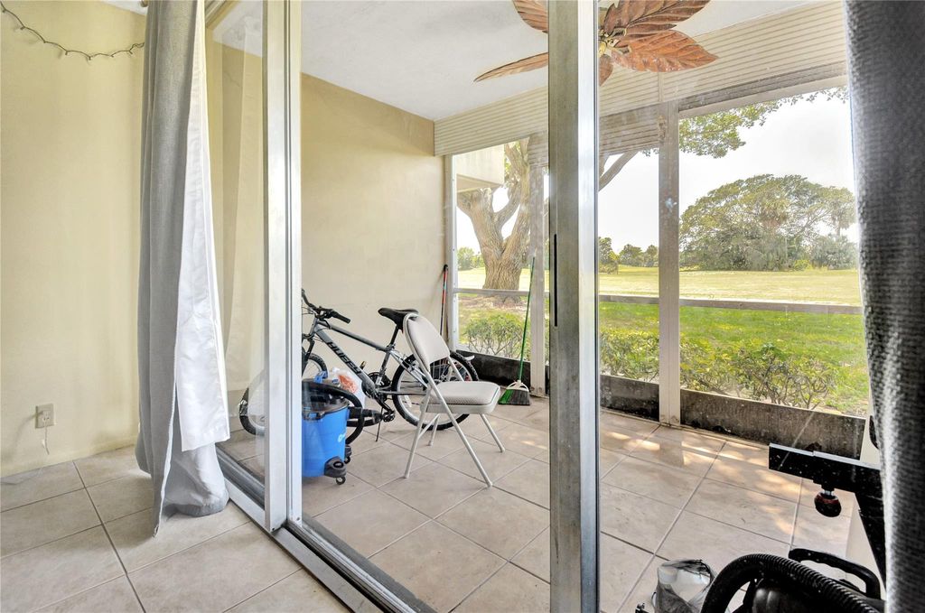 Photo of 2671 S Course Drive #105, Pompano Beach, FL 33069 (MLS # F10552610)