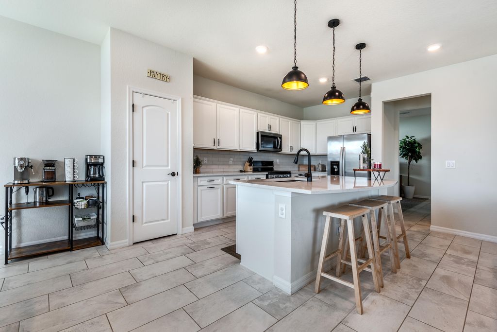 Photo of 10586 SW Captiva Drive, Port Saint Lucie, FL 34987 (MLS # R11048463)