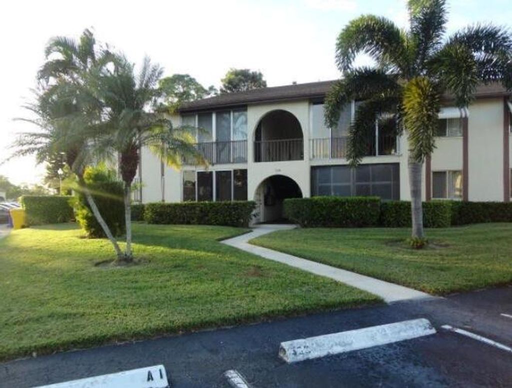 Photo of 421 Pine Glen Lane #C-1, Greenacres, FL 33463 (MLS # R11138588)