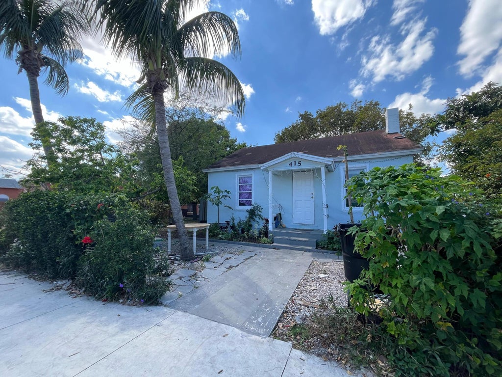 Photo of 415 N H Street, Lake Worth Beach, FL 33460 (MLS # B26031436)