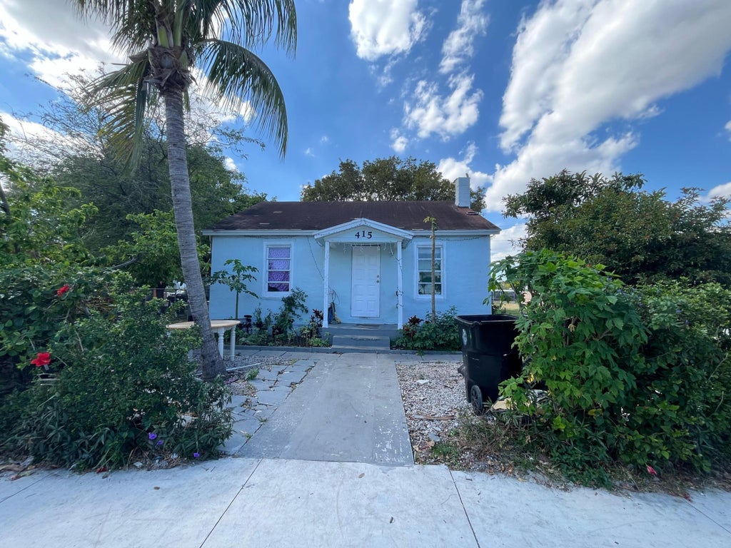 Photo of 415 N H Street, Lake Worth Beach, FL 33460 (MLS # B26031436)