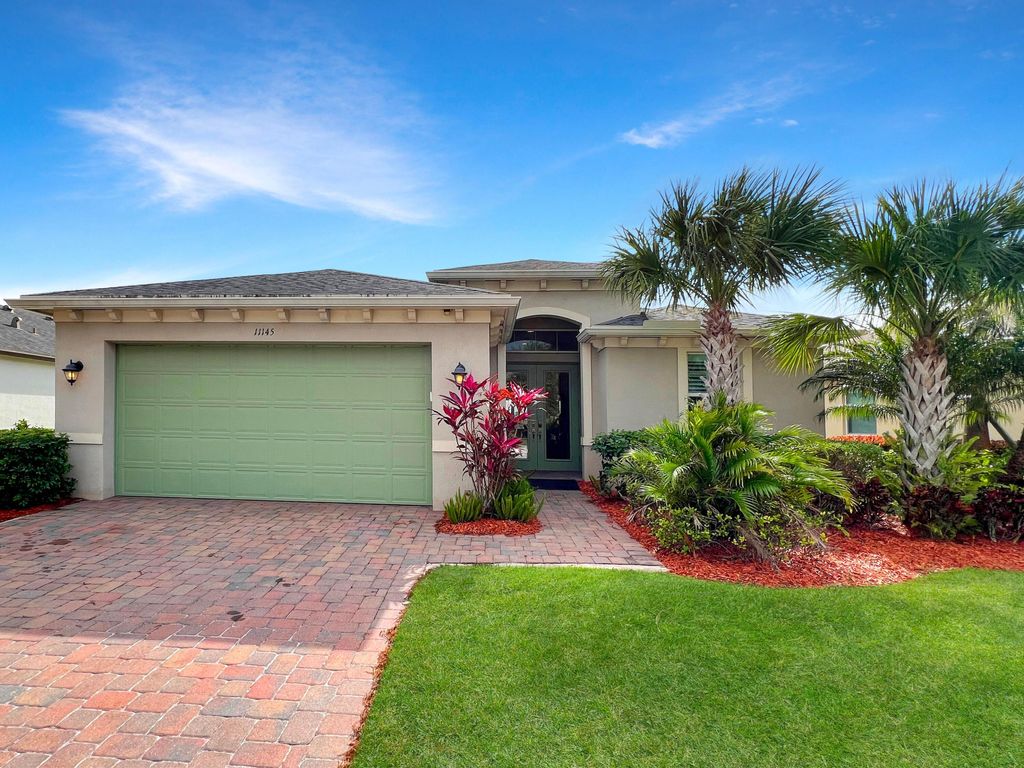 Photo of 11145 SW Lake Park Drive, Port Saint Lucie, FL 34987 (MLS # R10953664)