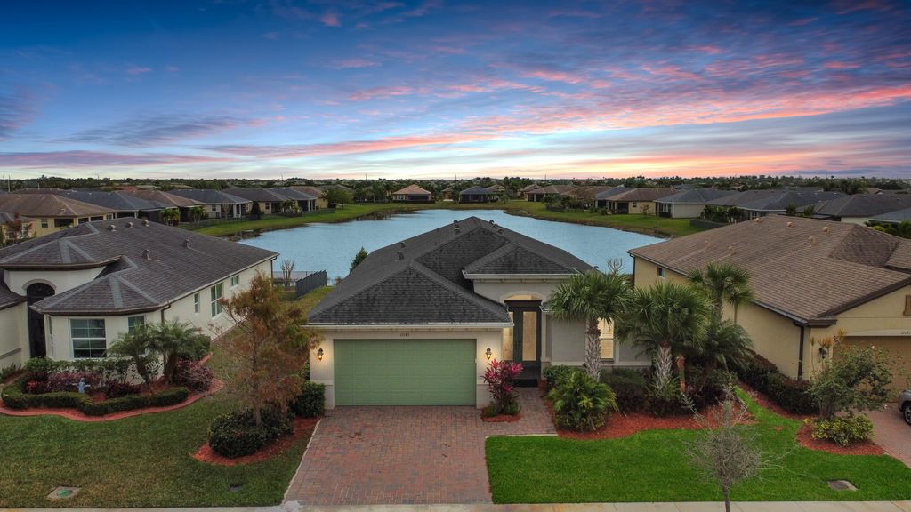 Photo of 11145 SW Lake Park Drive, Port Saint Lucie, FL 34987 (MLS # R10953664)