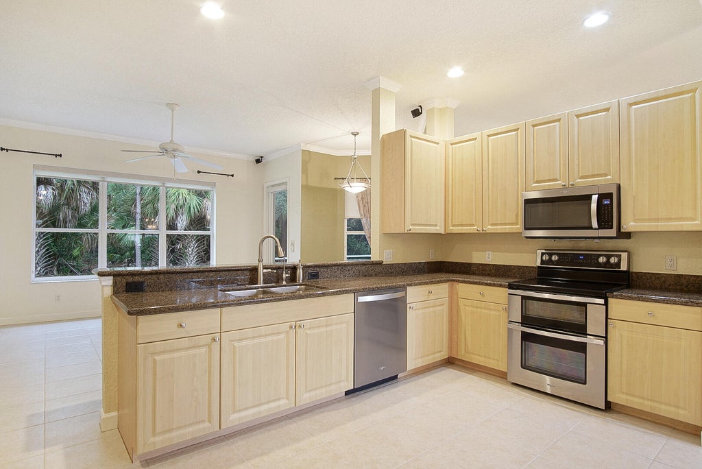 Photo of 430 NW Dover Court, Port Saint Lucie, FL 34983 (MLS # R11129948)
