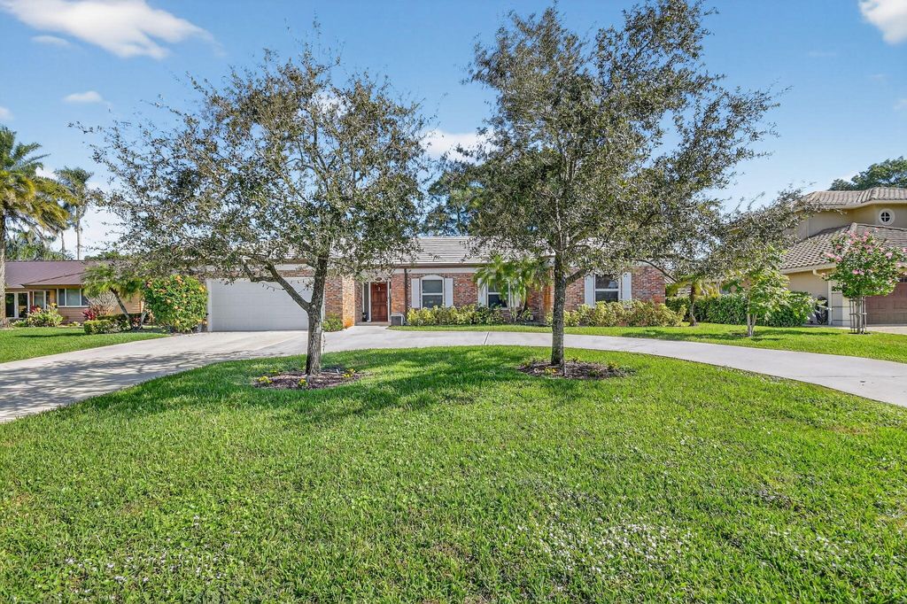 Photo of 224 Orange Tree Drive, Atlantis, FL 33462 (MLS # R11147257)