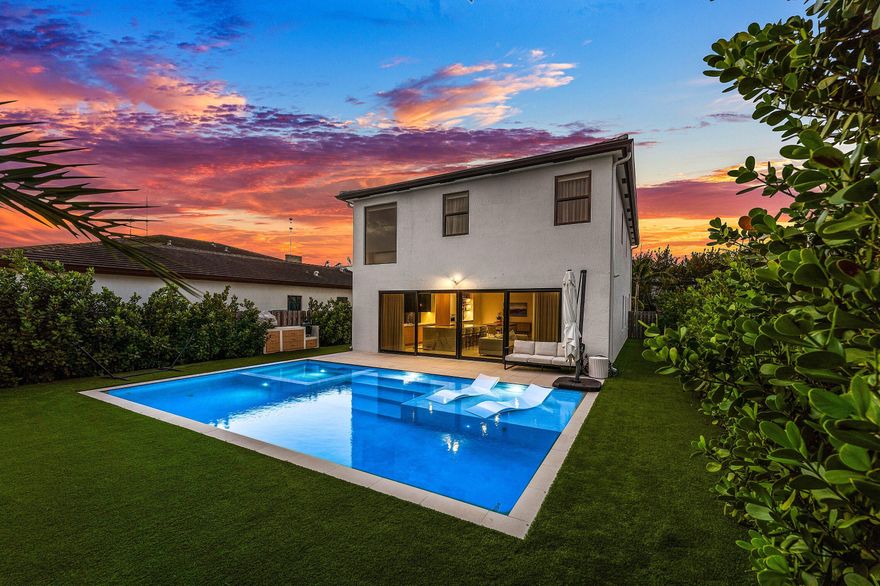 Welcome to a home that defies expectation. Built in 2019 and completely reimagined with a top-to-bottom renovation, this 5-bedroom, 4.5-bathroom residence is a modern masterpiece featuring bespoke finishes rarely seen at this price point. Every inch of this home has been curated with the highest level of craftsmanship, offering a living experience that is both opulent and functional. 

The heart of the home is the world-class chef's kitchen, a true culinary showstopper. It is equipped with the finest appliances available, including a Thermador Freedom induction cooktop, a Thermador double oven with steam capability, and massive 30'' Thermador fridge and freezer columns. For the ultimate convenience, enjoy a Miele ''knock-to-open'' dishwasher and a built-in Miele coffee machine capable of brewing three different bean types for barista-level mornings.

Featuring a bold, open-concept floor plan, the primary suite serves as a private oasis of relaxation. The spa-inspired bath is anchored by a massive 74"x47" deep-soaking tub and a premium Kohler shower system. Sleek lines, integrated designer finishes, and this contemporary layout make this the ultimate space for modern living.

Step outside to your private backyard oasis, featuring an oversized heated swimming pool with a beautiful spa that features state if the art jets and a fully equipped summer kitchenperfect for year-round entertaining. Complete with premium synthetic turf for effortless, year-round greenery and a lush privacy hedge for ultimate seclusion. A perfect blend of high-end design and low-maintenance ease. Additional luxuries include a 2-car garage and a SpringWell whole-house water filtration and softener system. 
This fully automated smart home features a Brilliant smart lighting system, wired Ring security cameras, and Nest smart climate/smoke detection for ultimate peace of mind. 

This is not just a home; it is a standard of living usually reserved for multi-million dollar estates. Located in an exclusive gated community just minutes from Aventura and major highways, this 2019-built estate offers a level of luxury that rivalsand often exceedsnew construction priced over $2 million. Why wait years for a build when this fully renovated modern masterpiece is ready for you right now?