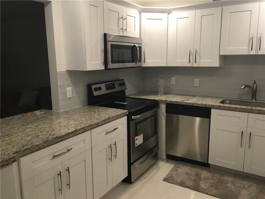 TOP WINNER REMODELED 2BEDROOM/2BATH CONDO WITH SPECTACULAR/PANORAMICLAKE AND FOUNTAIN VIEW. BRANDNEW KITCHEN COUNTERS WITH BEAUTIFULGLASS  BACKSPLASH AND GRANITE COUNTER TOPS. BRAND NEW SS APPLIANCES. PORCELAIN FLOORS THROUGH-OUT. NEW BASEBOARDS.NEW KITCH EN CEILING WITH HIGH HATS LIGHTING. TOP OF THE LINE BATHROOMS WIH NEW GLASS TOP VANITES. NEW LIGHTING, NEW MIRRORS AND NEW SHOWERS...EVERYTHING IS BRAND NEW! ENJOY WYNMOOR'S COUNTRY CLUB LIFESTYLE! DETAILS/COMMENTS POSTED ARE NOT GUARANTEED, ASSOC REQ