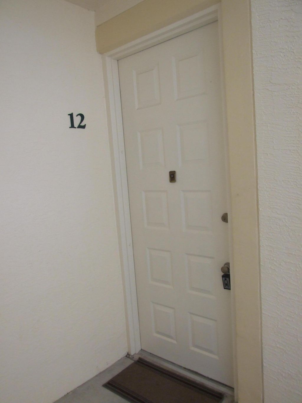 Photo of 4822 Chancellor Drive #12, Jupiter, FL 33458 (MLS # R11100594)