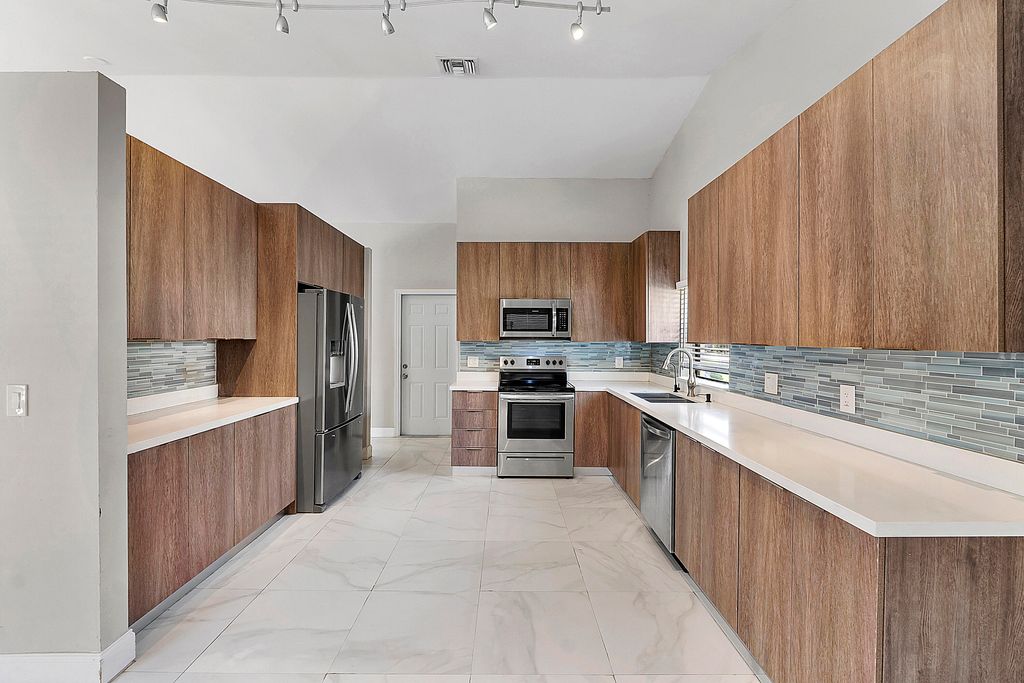 Photo of 11461 NW 39th Street, Coral Springs, FL 33065 (MLS # B26021529)