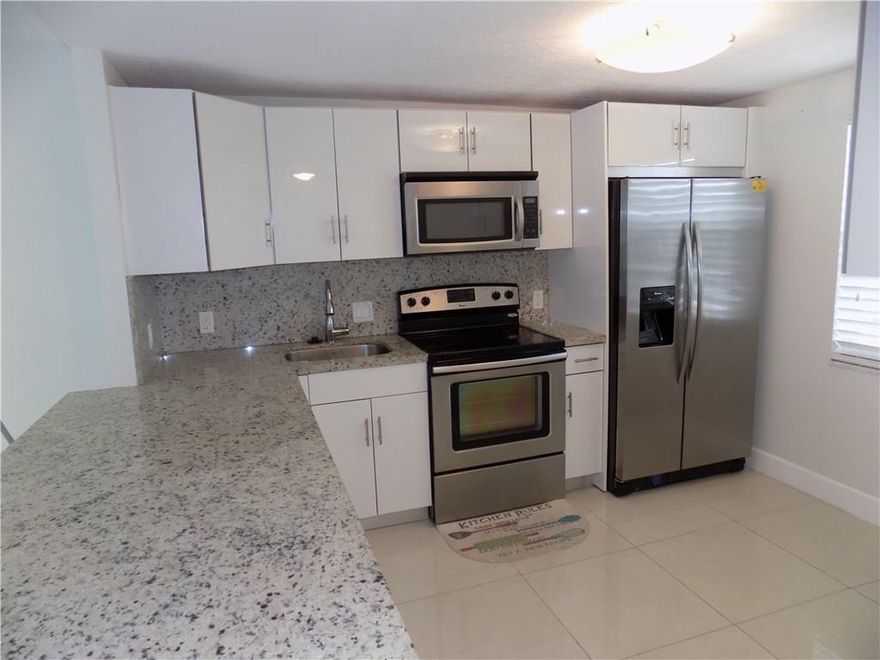 Beautiful 2 bedrooms and 2 bathrooms remodeled apartment in Palm Aire! Open kitchen to social areas, new appliances, tiled in social areas, carpet in bedrooms, golf view, very bright and spacious unit, lots of closets, washer and dryer in the unit, near shops, restaurants. Walking distance to Publix and community park.
