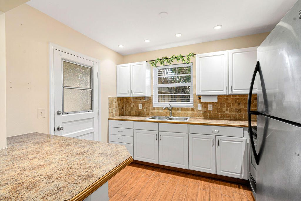 Photo of 10821 N Military Trail #1, Palm Beach Gardens, FL 33410 (MLS # R10776777)