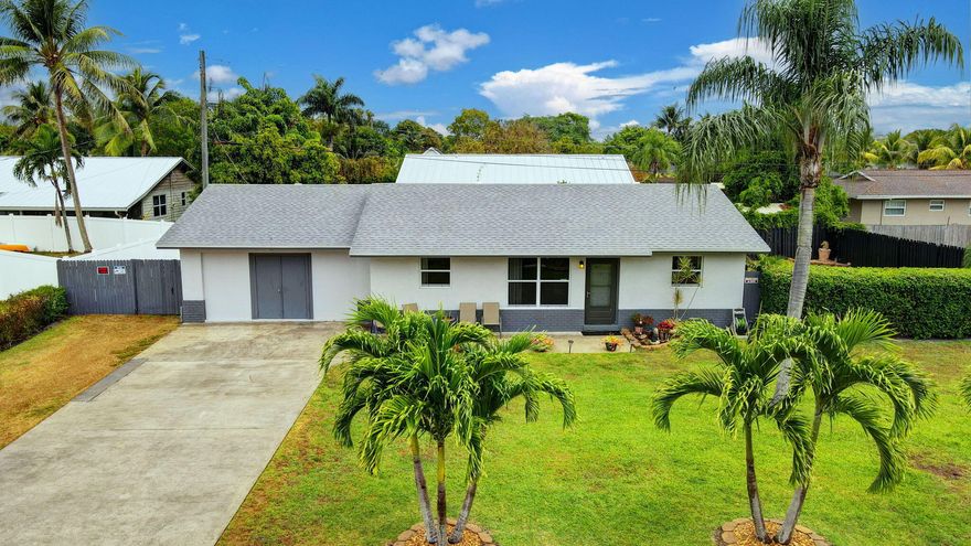 Welcome to Tropical Country Estates! This is a no HOA single family home community in a GREAT location. This 3/2 has been lovingly taken care of by its long time owners.  Some Key features are Impact glass windows, 2022 new roof, 2025 new AC and Vinyl flooring throughout.  It has a large fenced yard that is great for pets, kids, or installing a pool. This home also would make a great investment property.