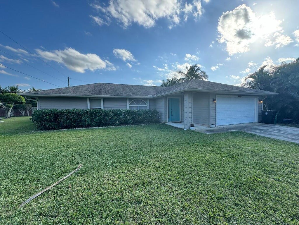Photo of 1674 SW Whipple Avenue, Port Saint Lucie, FL 34953 (MLS # R10963725)
