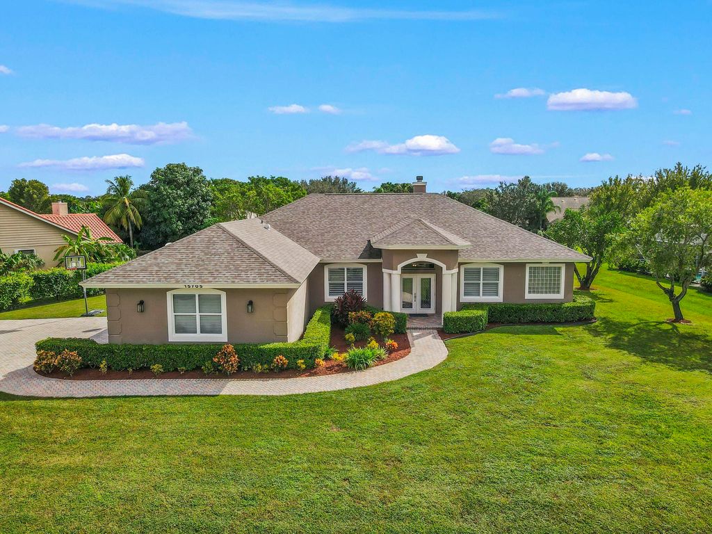 Photo of 15705 Meadow Wood Drive, Wellington, FL 33414 (MLS # B26030964)