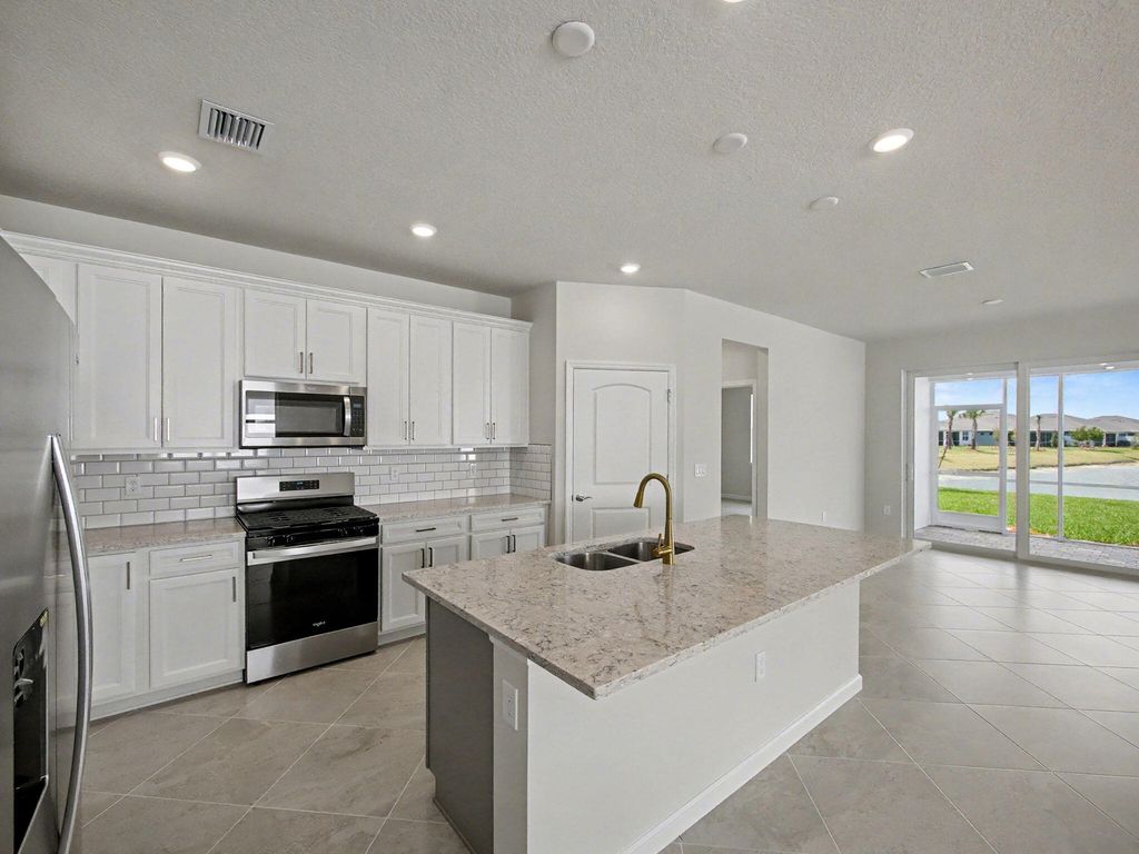 Photo of 14172 SW Incarnadine Lane, Port Saint Lucie, FL 34987 (MLS # R11168593)