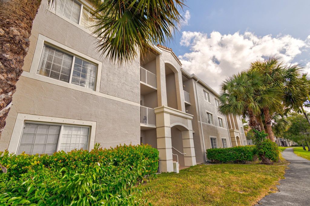 Photo of 5035 Wiles Rd #208, Coconut Creek, FL 33073 (MLS # F10407203)