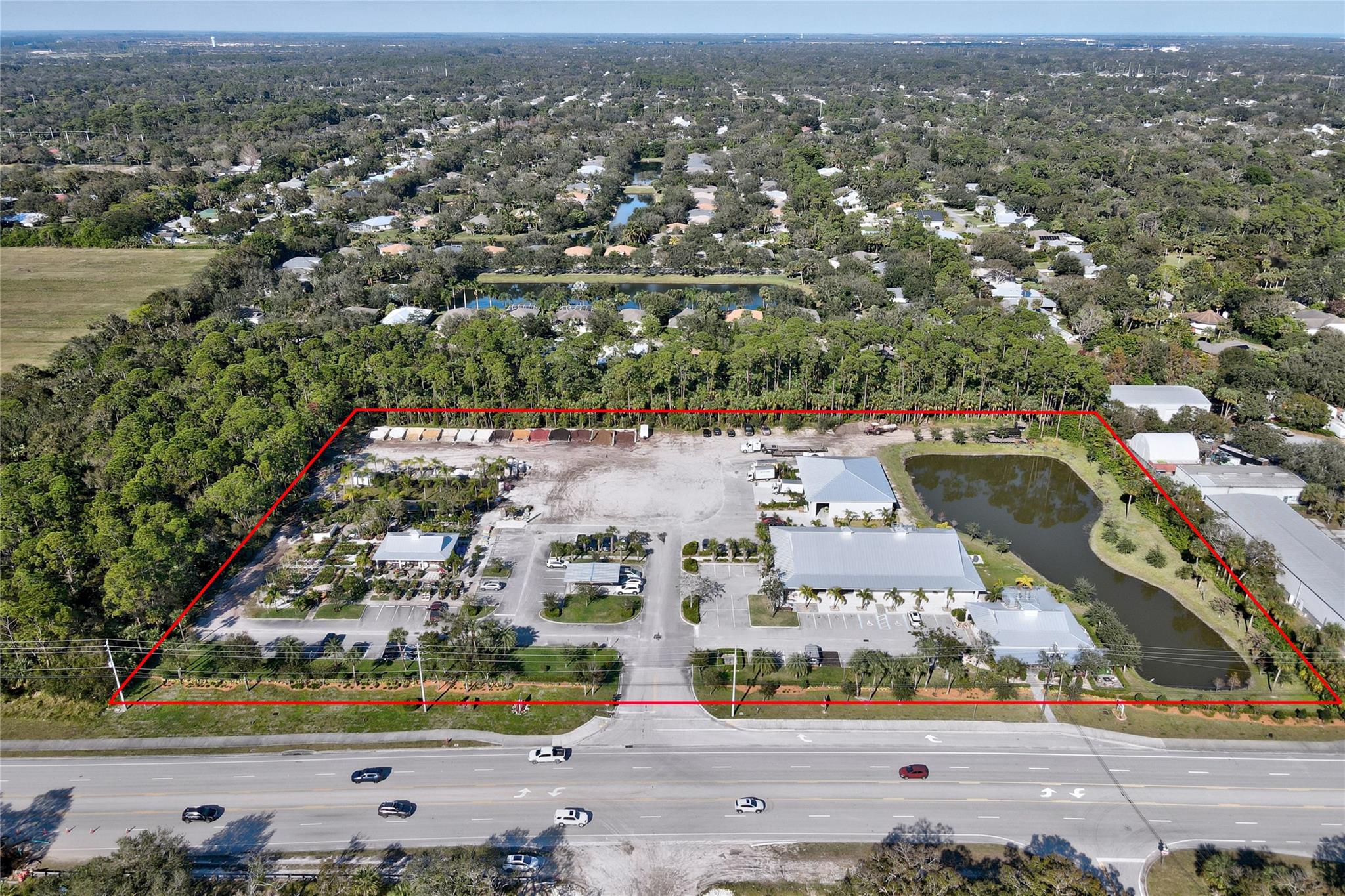 Open Air Produce Market, combined with Restaurant (Savor), Cold Storage Warehouse includes loading dock height and Nursery all landscaped to perfection! This One Of A Kind, Commercial site has room for further growth. Concrete Block construction require no repairs and were built between 2020 -2023. 4 buildings total 13,440 SF. High exposure in growing area on Oslo Rd with deceleration lane for perfect access. Sidewalk and high visibility with 20,000 plus traffic count daily. Monitored with camera and alarms. A true gem among mix of commercial growth. Owner will sell 3 rental building separate for $7,500,000
Room for expansion on Nursery side. Could be great Car Lot etc...
