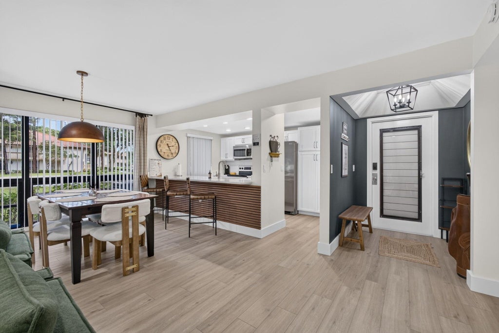 Photo of 124 BRACKENWOOD Road #124, Palm Beach Gardens, FL 33418 (MLS # B26070984)