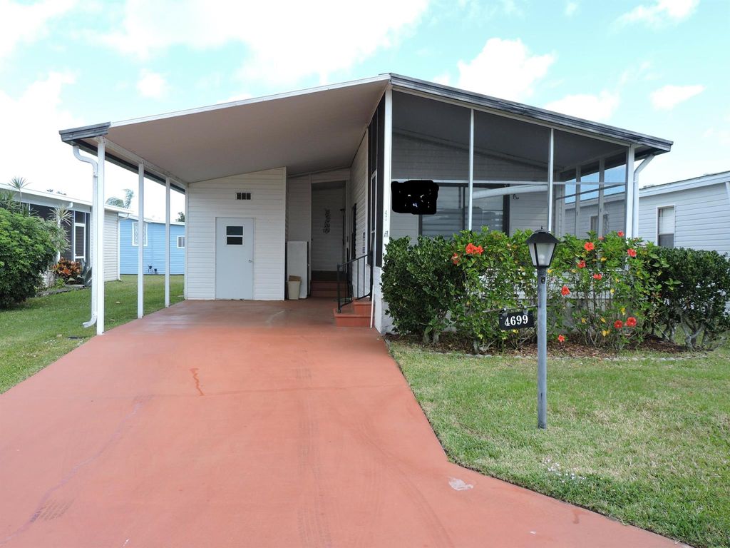 Photo of 4699 SE Tallowood Terrace, Stuart, FL 34997 (MLS # R10909172)