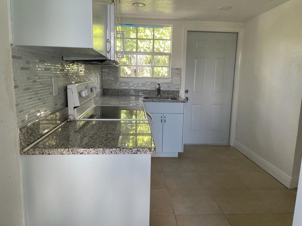 Photo of 2424 Ware Drive, West Palm Beach, FL 33409 (MLS # R10930842)