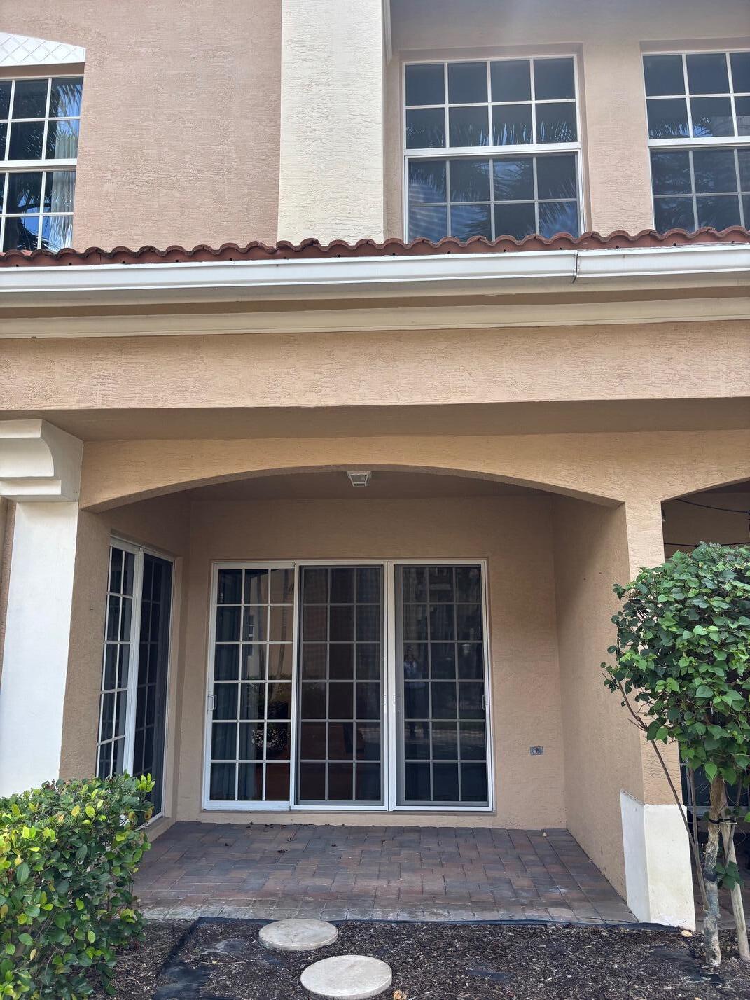 Great Location All impact windows and Sliding doors.Walk just 50 feet to have access to a private gate for the community to have access to multiple restaurants and stores,Gym etc,Home is completly furnished with TV'S and cable included.