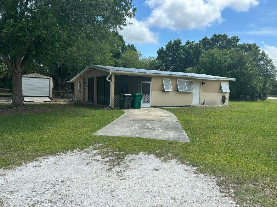 Charming 3-bedroom, 2-bathroom home nestled on an oversized lot, this sturdy residence boasts a newer metal roof. It includes a storage shed for all your tools, a fenced area for your pets, and lovely mature trees adorning the property.