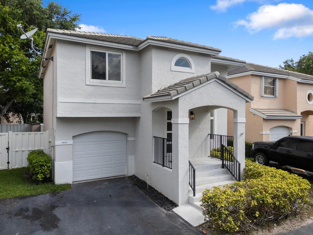 Photo of 9859 NW 2nd Street, Plantation, FL 33324 (MLS # B26028326)