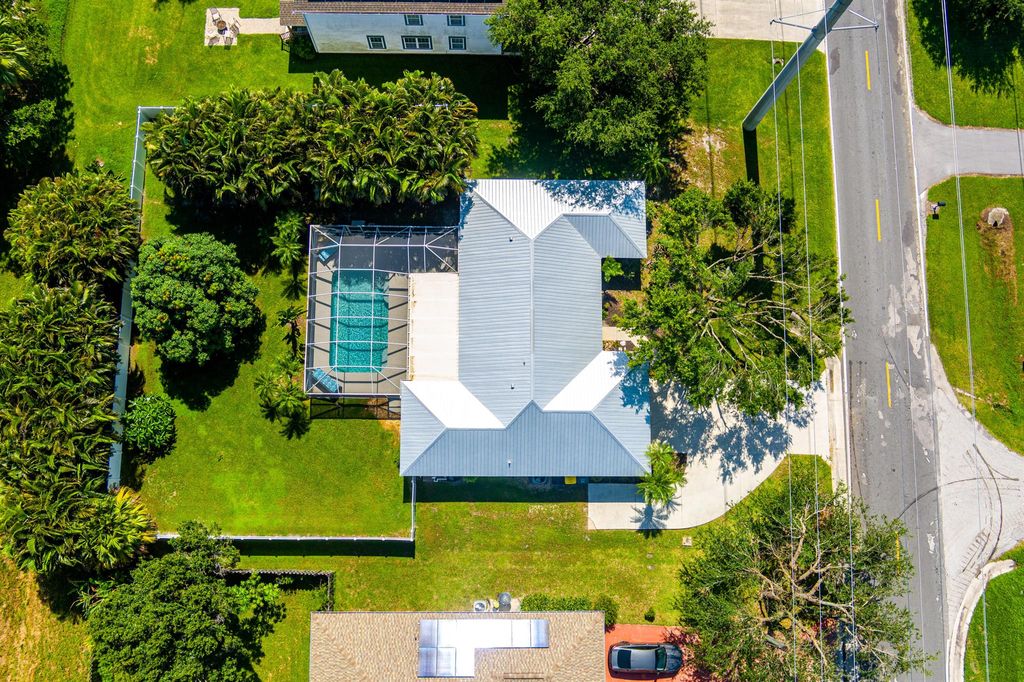 Photo of 1004 W Weatherbee Road, Fort Pierce, FL 34982 (MLS # R11106466)