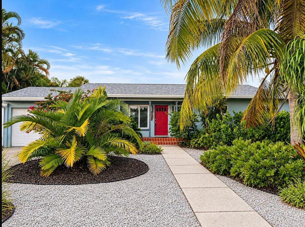 Photo of 164 BRYN MAWR Drive, Lake Worth Beach, FL 33460 (MLS # B26093243)