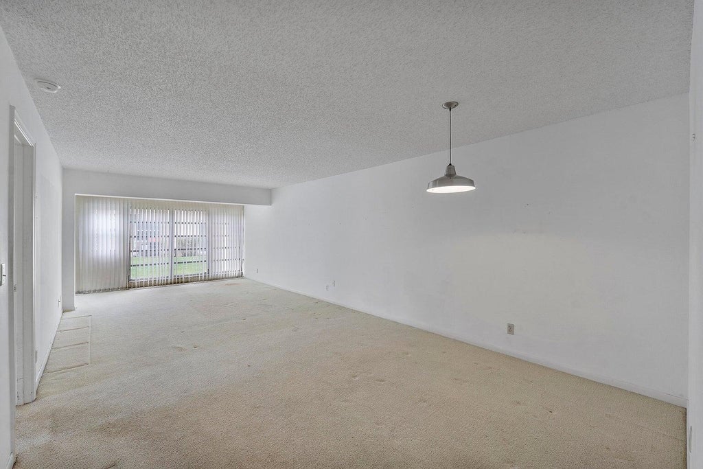 Photo of 1141 VIOLET Terrace #101, Delray Beach, FL 33445 (MLS # B26059928)