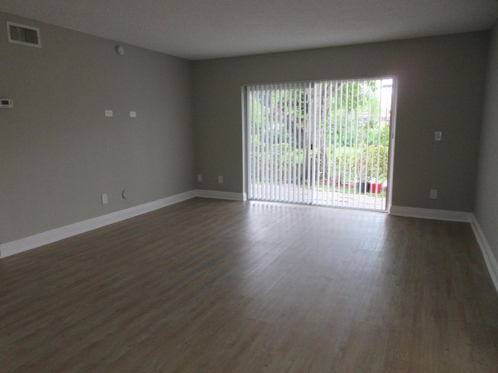 Photo of 4065 NW 114th Avenue, Coral Springs, FL 33065 (MLS # B26021197)