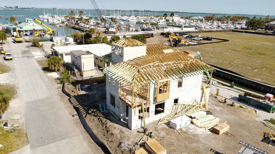 Here is your opportunity to experience this groundbreaking development connecting Fort Pierce's historic downtown with Edgartown. Soon to be a Creative & Contemporary waterfront arts, entertainment & living district in downtown Fort Pierce. There is a total of just 10 Luxury villas being built by INB Homes. The villas were drafted by Cronk Duch Architecture, evoking a strong focus on structures & design that enhance and complement the existing pedestrian friendly atmosphere of Fort Pierce. The exteriors, Anglo-Caribbean in style, feature crimp metal roofs, open eaves, balconies, and all impact glass windows and doors. The interiors, all executed with exquisite craftsmanship and appointed with fine finishes, (including an ELEVATOR) range in 3 different style options curated by Smith Interior Design. The renderings represent "Contemporary Beachside" however you can choose your design package for the build process.  Other interior packages include the "Palm Beach Classic" and "Timeless West Indies" offering design options that range from traditional to sleekly contemporary. State-of-the-art Café kitchen appliances include a gas range with a pot filler and coordinating range hood. The primary bath features a standalone soaking tub. Each luxury villa is a 3 bedroom, 3 ½ bathroom set up with a 2-car garage set up in a way that evokes airy living and dining rooms to cozy studies and bedrooms that open onto balconies with sweeping downtown views, it will inspire anyone yearning for a stylish coastal life. Expected completion date is August 2026. Ask about our current incentives and upgrade options!