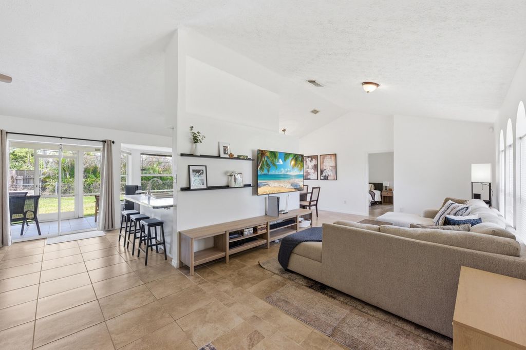 Photo of 390 SE Cork Road, Port Saint Lucie, FL 34984 (MLS # B26022908)